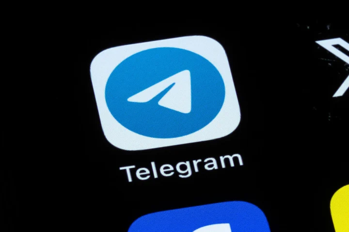 Telegram app and X