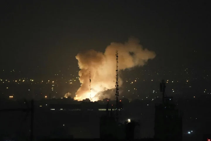 Smoke rises after an explosion in Tehran