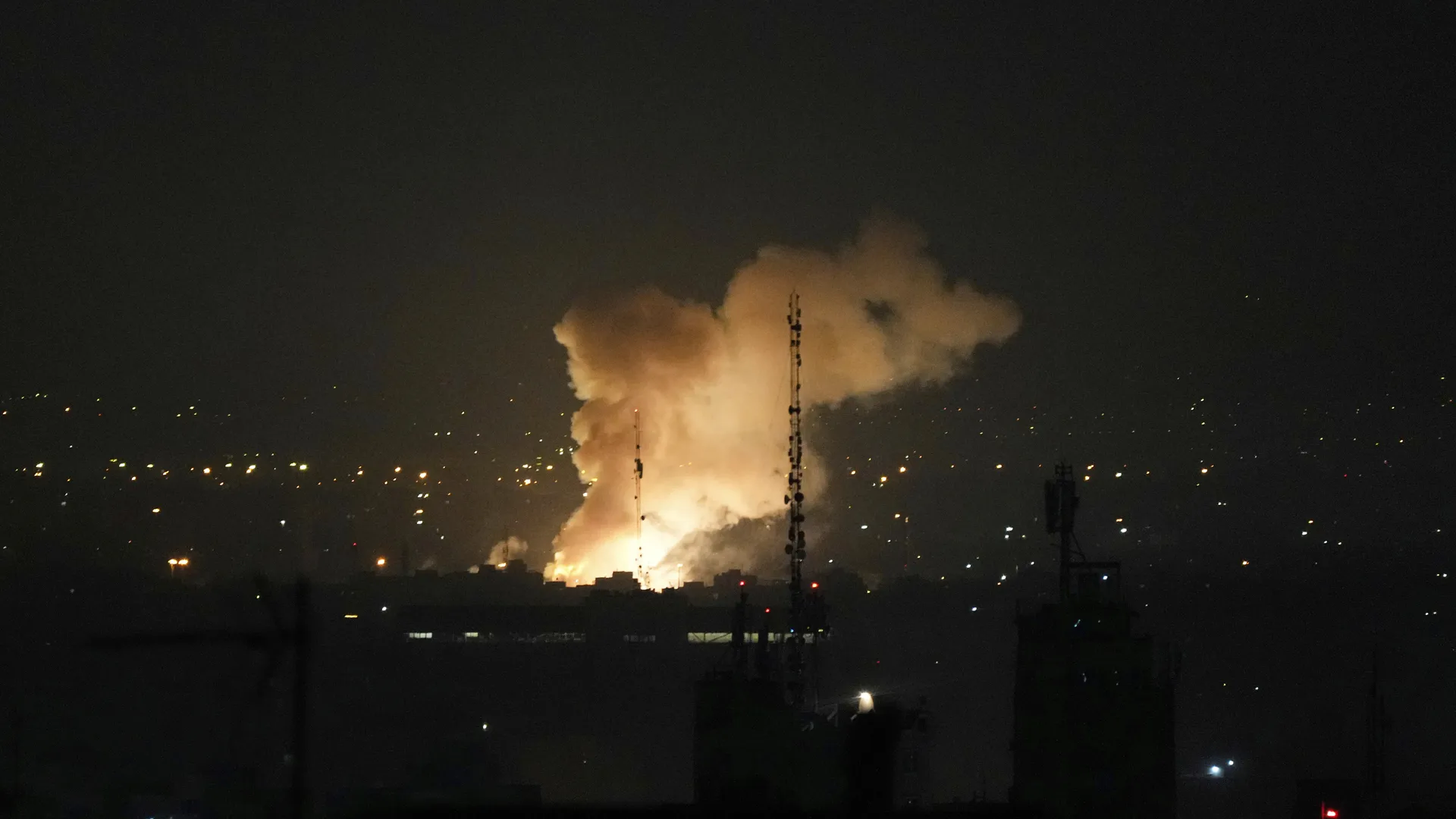 Smoke rises after an explosion in Tehran