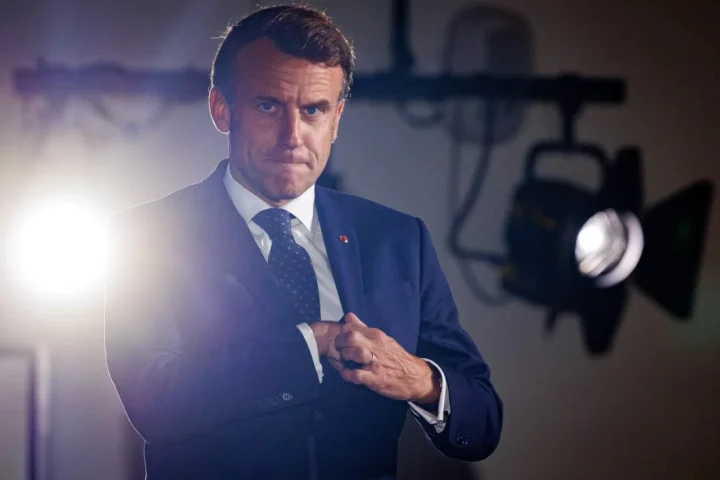 Macron is looking for something.