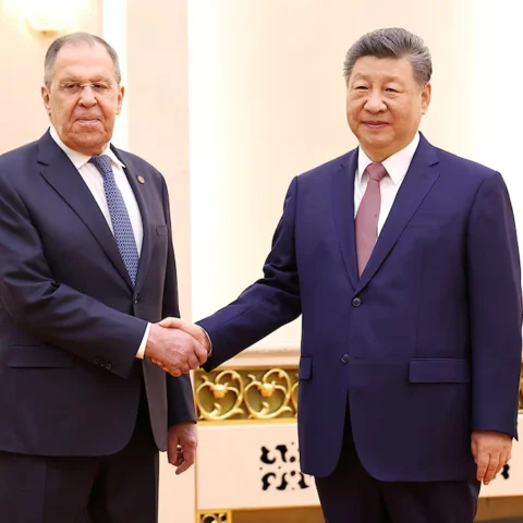 Chinese President Xi Jinping and Russias Foreign Minister Sergei Lavrov